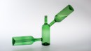 Equilibre, vert 2, 2009. Composition of three bottles that are stable only with water inside. Bottles are blown and then fused together.<br />Design and making : Alain Villechange. 2009.<br /><br />Photographic credit : Xavier Nicostrate. - Laurence Brabant Alain Villechange